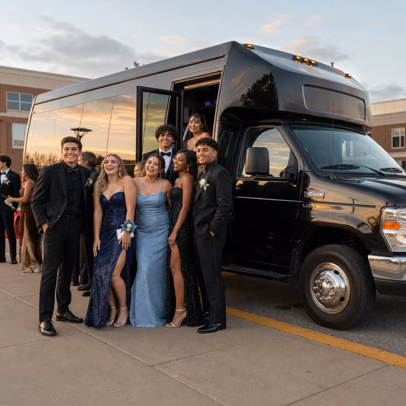 Group boarding a white charter bus for Prom & Homecoming Transportation transportation in Arlington