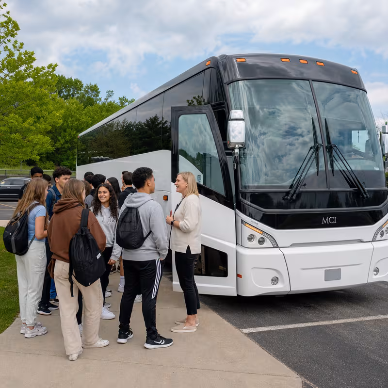 Black Mercedes Sprinter van staged for an Arlington School Transportation group