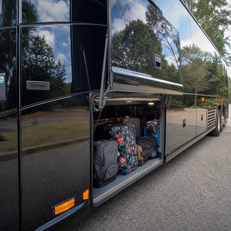 Party bus interior with wraparound leather seating and LED lighting in Arlington